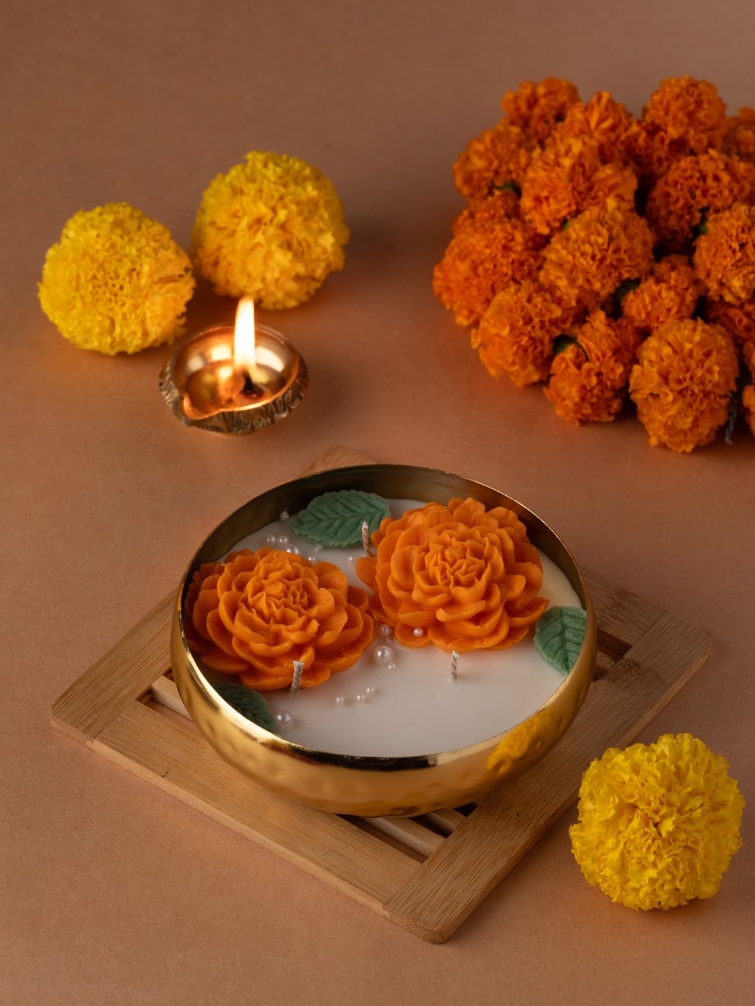 Genda Phool – Hand-Hammered Floral Urli — hand-poured Diwali candle by The Scented Palette