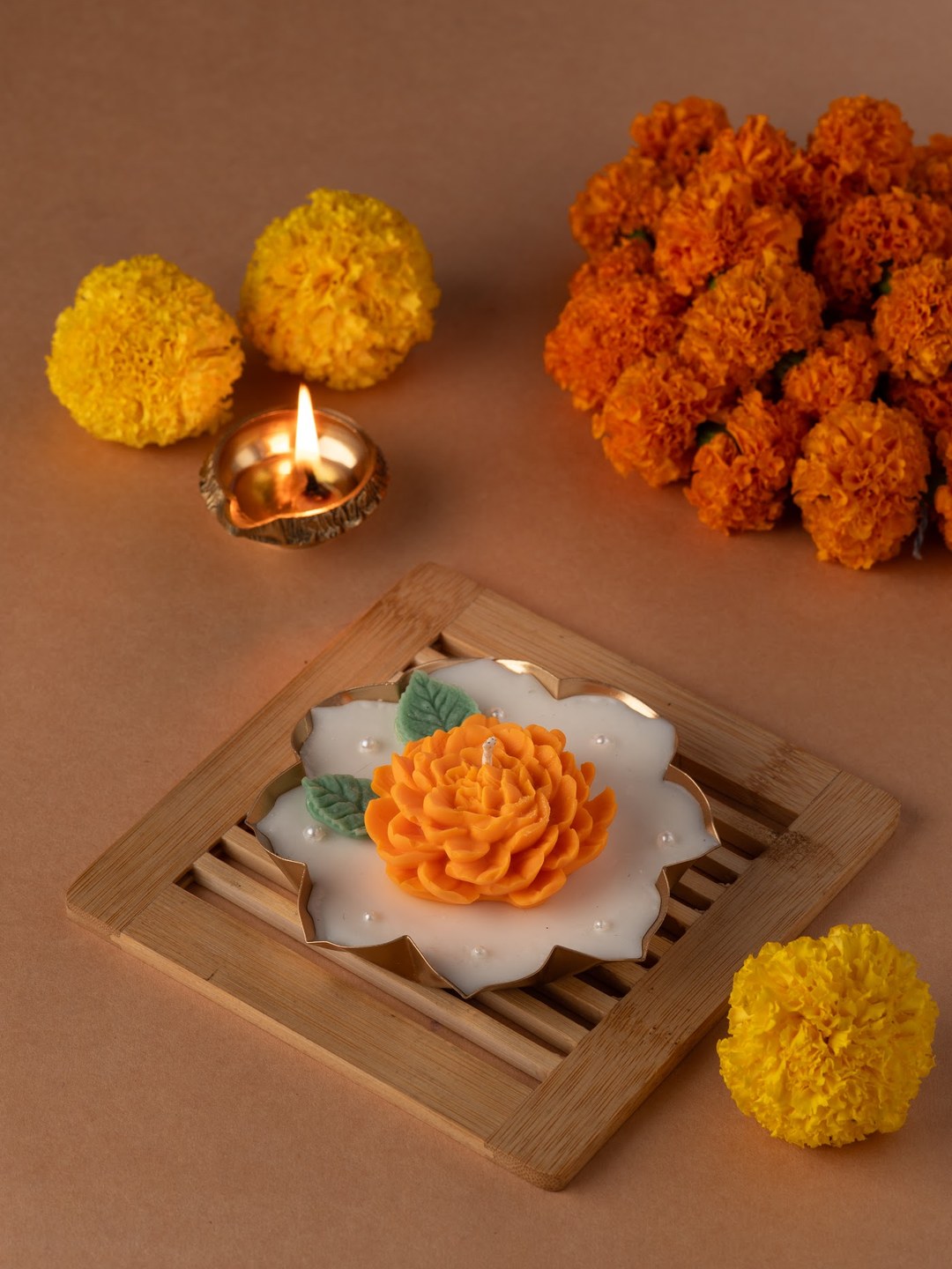 The making of Riwayat — sculpting wax marigolds, roses and festive candles by hand